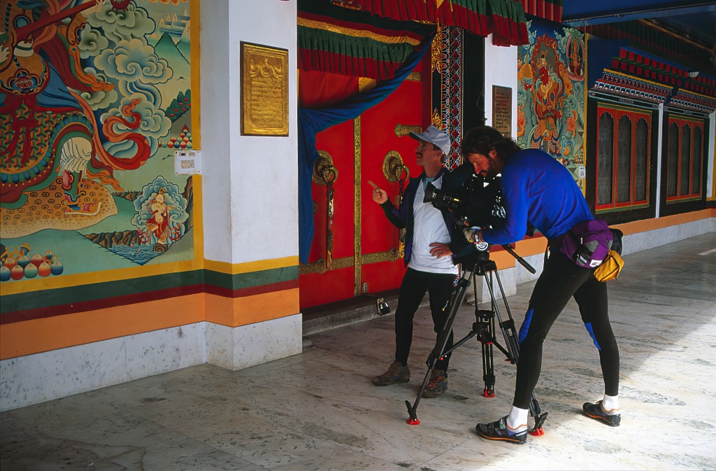 Directors of Photography Mark Schulze and Marco Eveslage videotaping murals at Sikkim temple, India